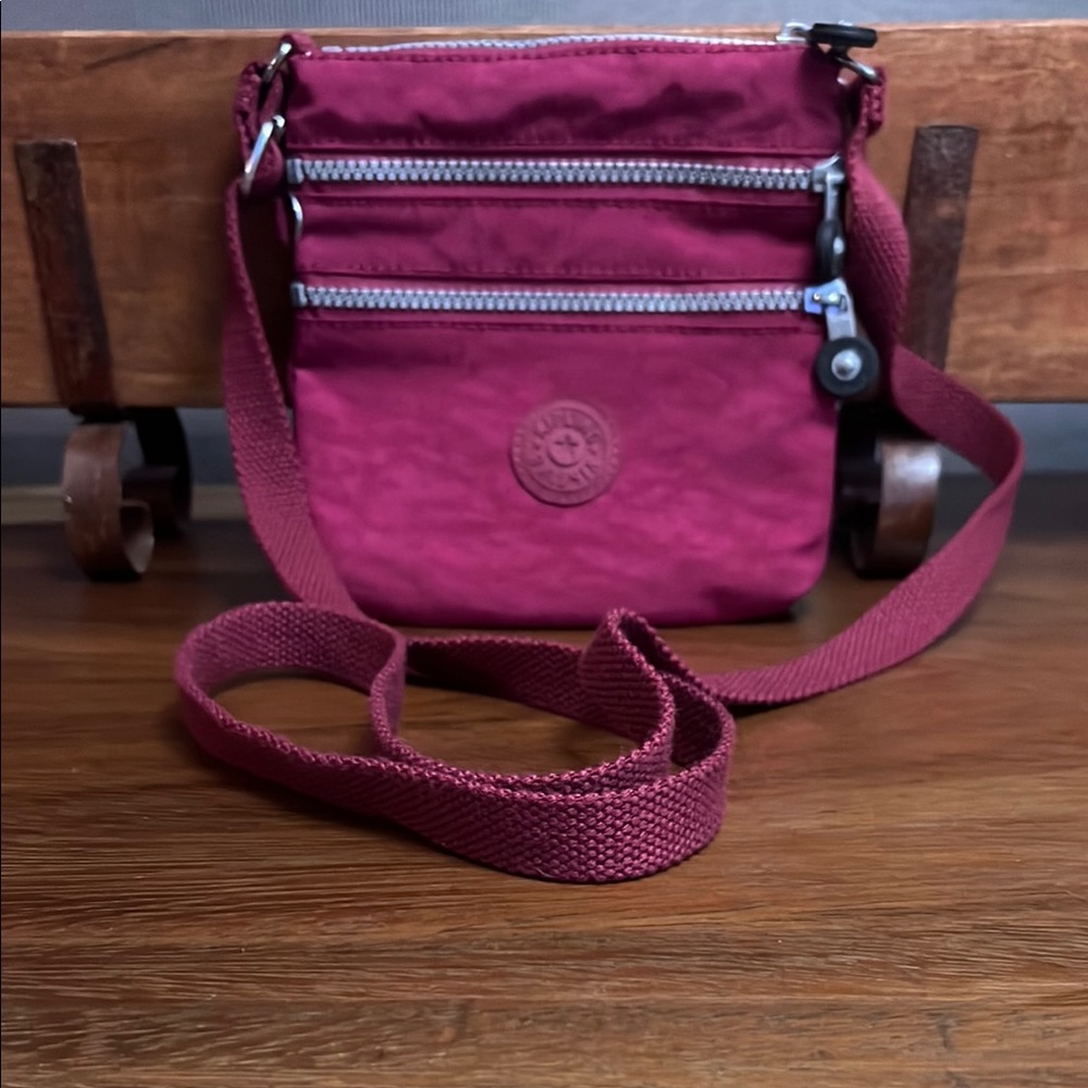 Kipling Pink Crossbody Bag with Adjustable Strap and Signature Logo
